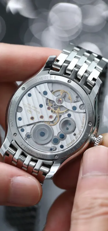 Manual winding watch crown operation